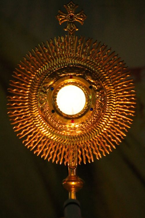 eucharist adoration sacred