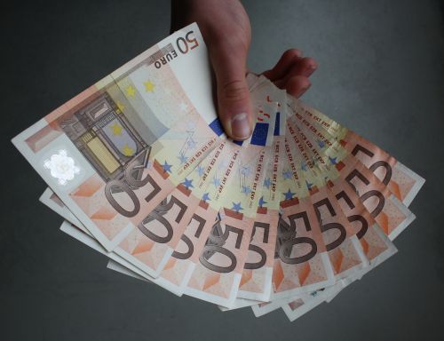 euro banknotes hand