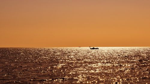 evening sea boats