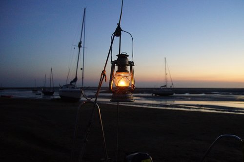 evening  north sea  kerosene lamp