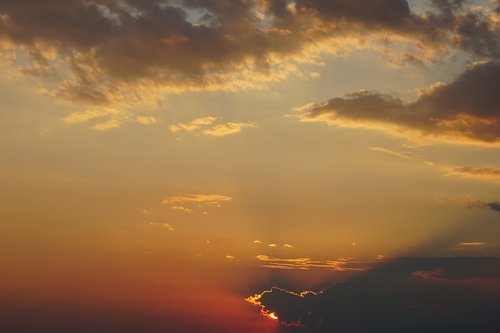 evening sky  sunset  rays