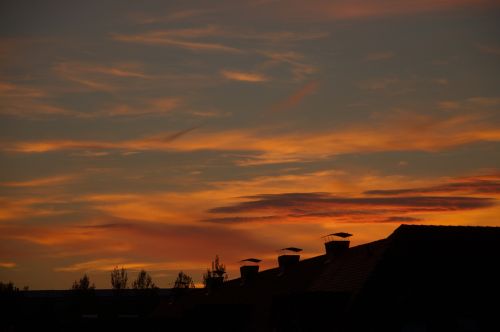evening sky sunset roofs