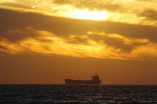 evening sky container ship sea