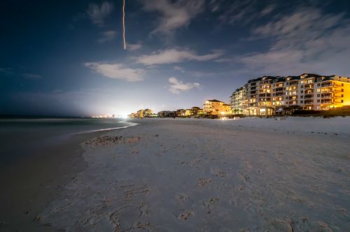 Evening Walk On A Beach