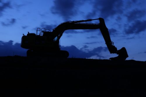 excavators night night construction site