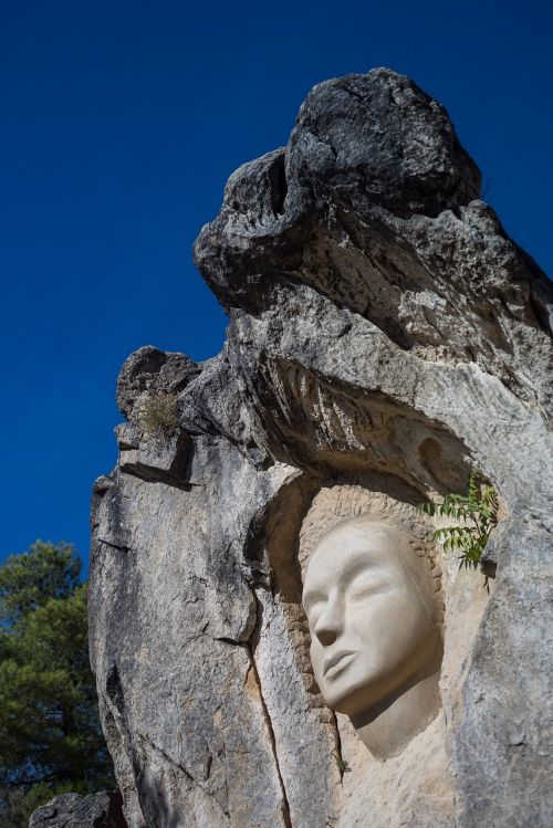 faces sculpture stone
