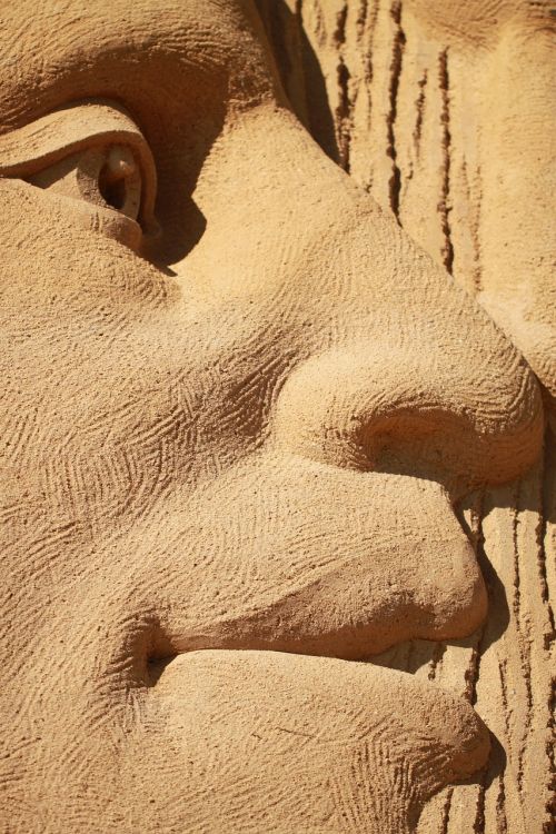 face sand sculpture
