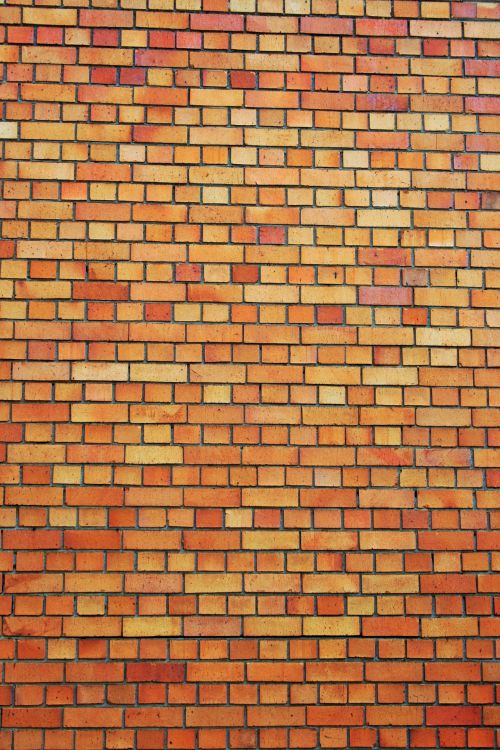 Face Of Yellow Brick Wall
