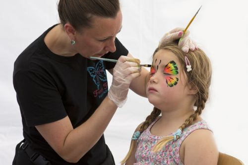 face painting young girl artist