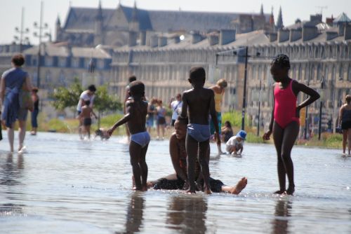 family in water family playing bordeaux