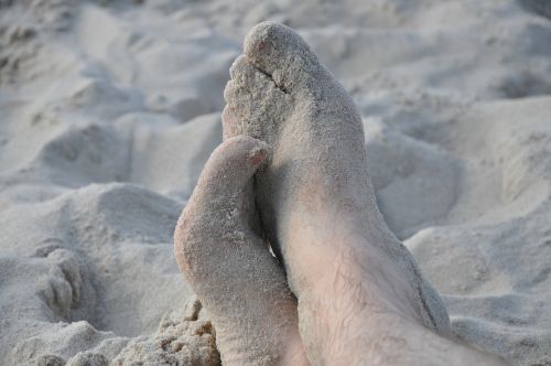 feet legs sand