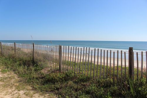 fence beach ocean