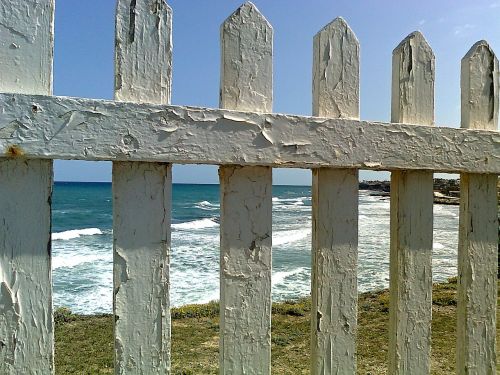 fence sea beach