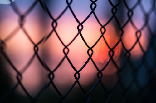 fence sunset dark