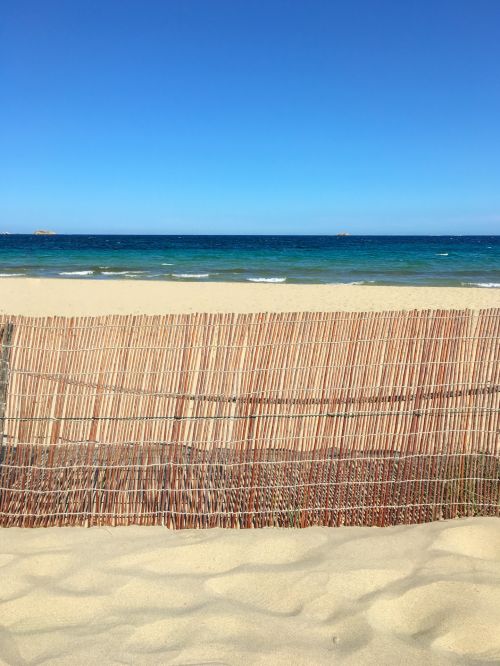 Fence On A Beach
