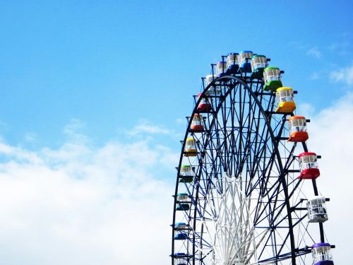 ferris wheel colorful blue sky