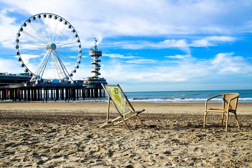 ferris wheel  beach  sea