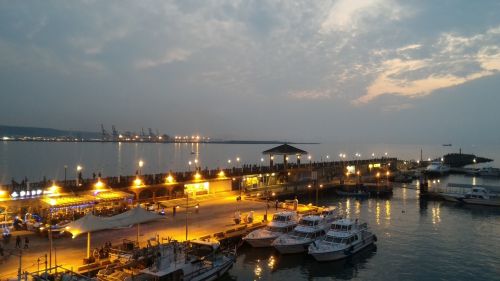ferry terminal at dusk fisherman's bastion in hong kong