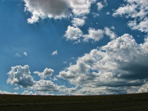 field sky clouds