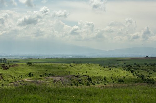 field  spring  clouds