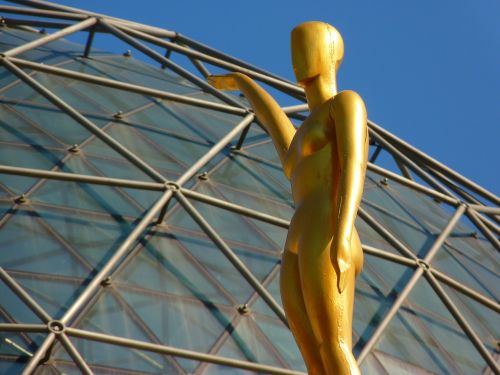 figure glass dome golden
