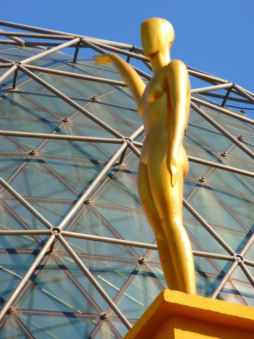 figure glass dome golden