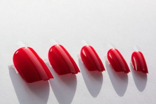 fingernails red lacquered