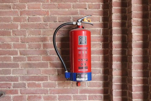 fire extinguisher  wall  fire