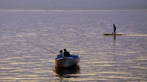 fishermen boat lake