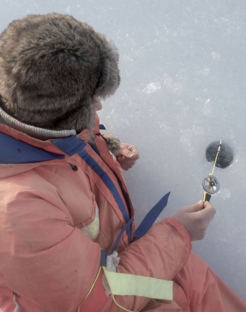 fishing ice fishing man