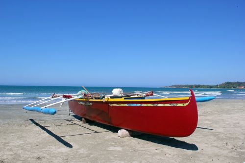 fishing boat beach ocean