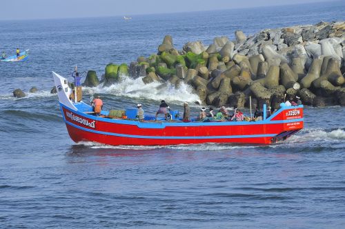 fishing boat perumathura beach colourful