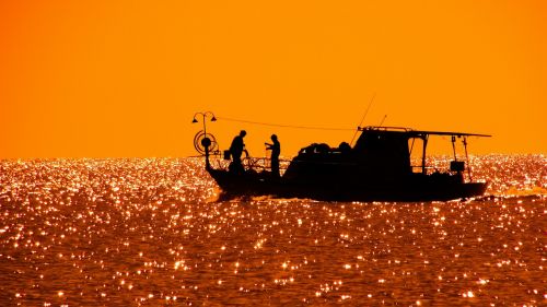 fishing boat afternoon sunset