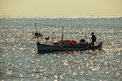 fishing boat sea afternoon