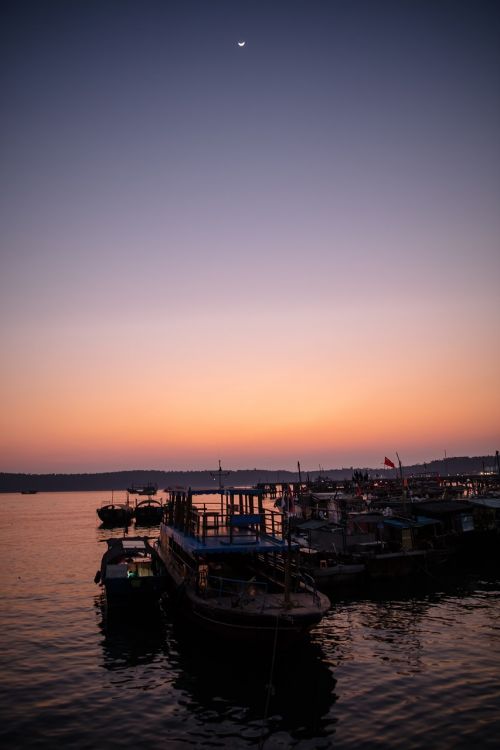 fishing boats sunset wooden