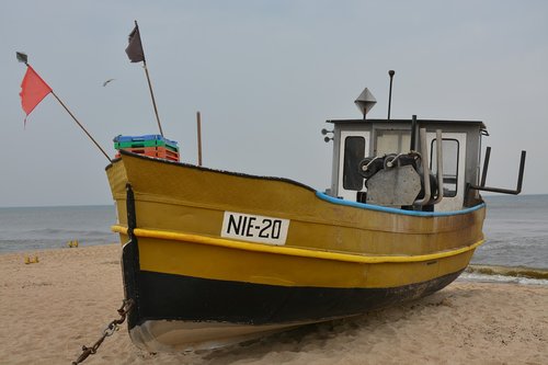 fishing vessel  cutter  beach