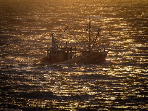 fishing vessel fishing boat sunset