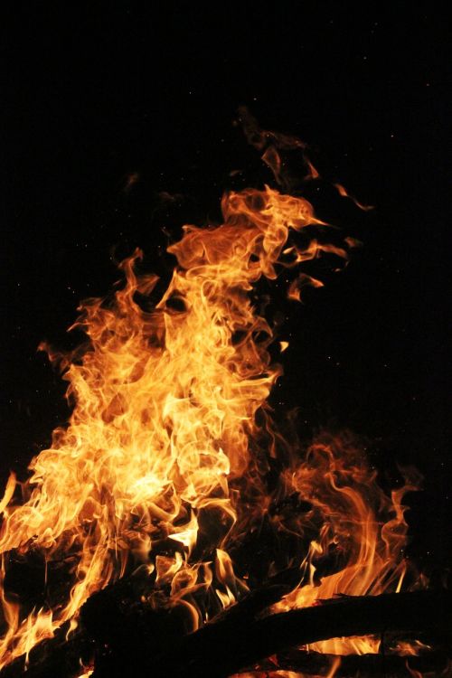 flame sparks the bonfire