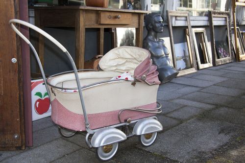 flea market baby carriage bust