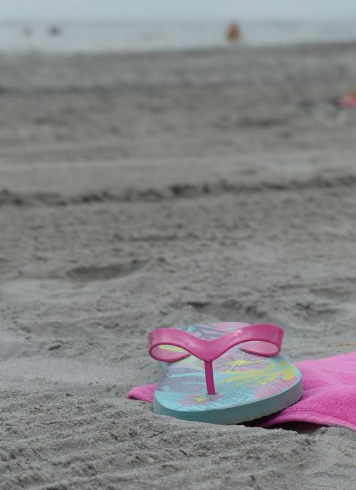 flip flops beach sand