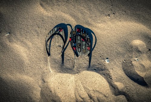 flip flops  sand  beach