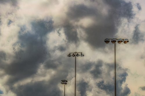 floodlight  clouds  lamps