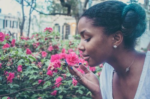 flower woman smelling
