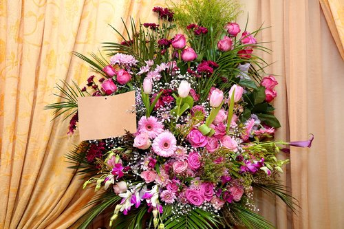 flower arrangement with card  bunch of flowers  flower arrangement