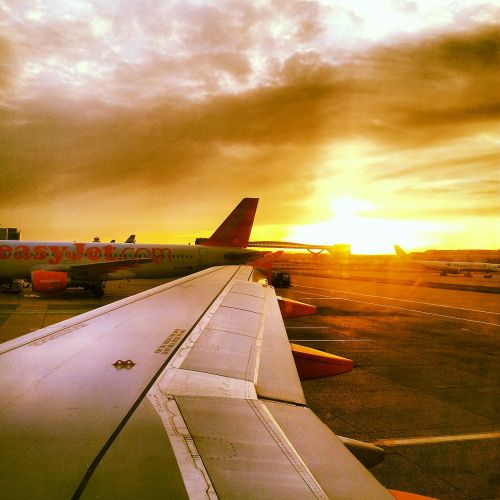 fly travel sunset
