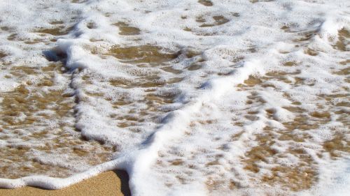 foam sea sand