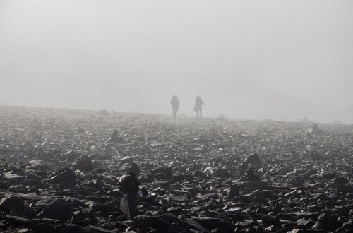 foggy hikers landscape