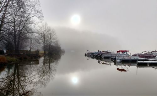 foggy lake marina