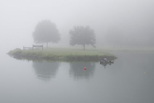 foggy morning fisherman lake nature