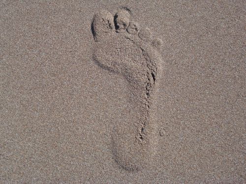 foot reprint sand